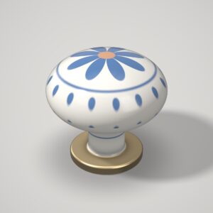 Pomo de cerámica blanca con decoración floral azul y base dorada envejecida